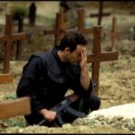 1992: Bosnia. A combattant mourns a fallen comrade during the siege of Sarajevo. 1992: Bosnia. A combattant mourns a fallen comrade during the siege of Sarajevo.